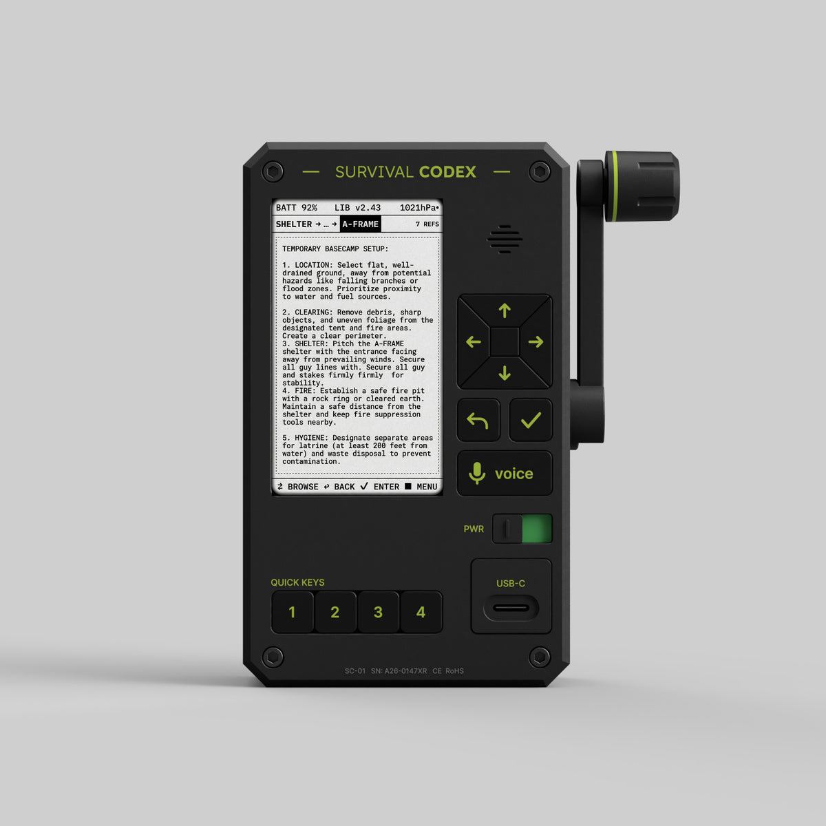 The Survival Codex hand-cranked offline knowledge device, screen on, showing a topographic map